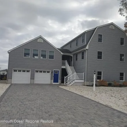 Rent this 4 bed house on 117 Sandy Point Drive in West Mantoloking, Brick Township