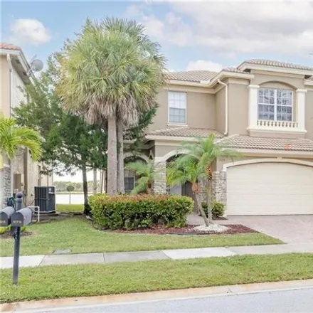 Rent this 4 bed house on 977 Northwest Leonard Circle in Port Saint Lucie, FL 34986