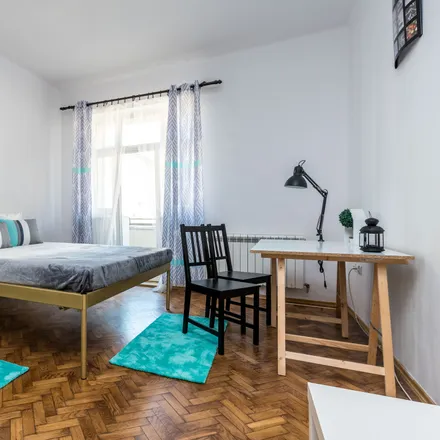 Rent this 4 bed room on Henryka Siemiradzkiego 10a in 60-763 Poznan, Poland