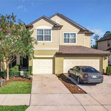 Buy this 3 bed townhouse on 1041 Pavia Drive in Apopka, FL 32703