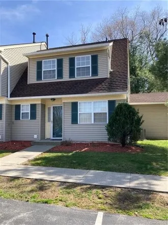 Buy this 2 bed townhouse on 10 Autumn Leaf Court in Village of Montgomery, Orange County