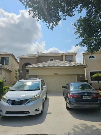 Buy this 3 bed house on 5208 Eagle Cay Way in Coconut Creek, FL 33073