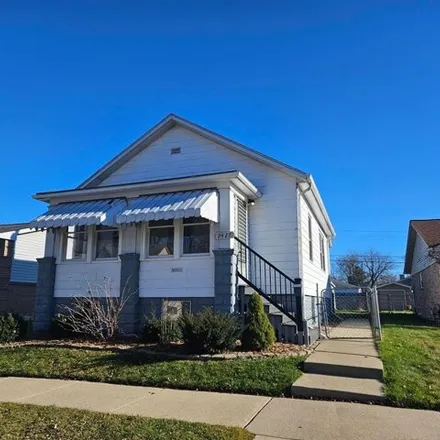 Buy this 2 bed house on 2437 Cora Street in Wyandotte, MI 48192