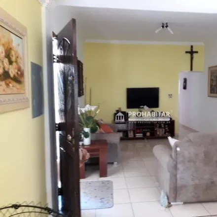 Buy this 4 bed house on Rua das Begônias in Flórida, Praia Grande - SP