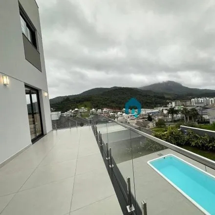 Rent this 3 bed house on Rua dos Tiés in Cidade Universitária Pedra Branca, Palhoça - SC