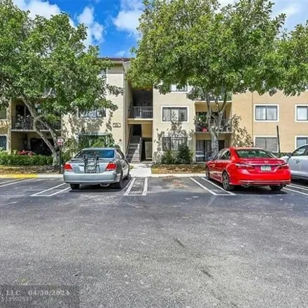 Rent this 2 bed condo on 9205 Riverside Drive in Coral Springs, FL 33071