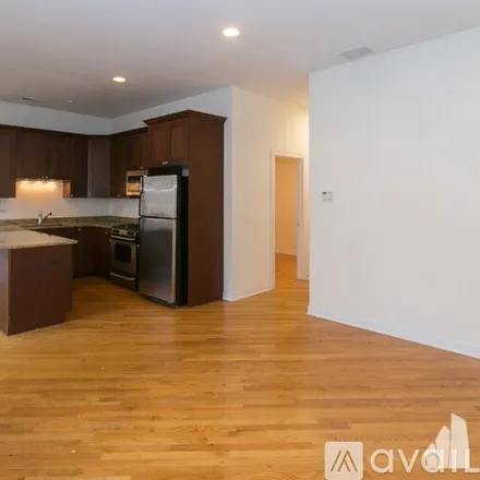 Rent this 4 bed condo on 1438 W Belmont Ave