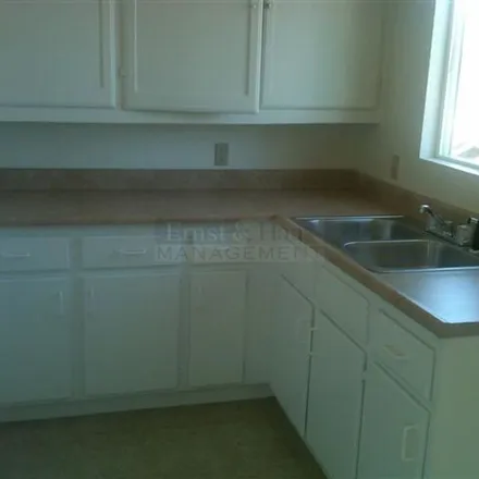 Rent this 4 bed apartment on 1219 Pine Avenue in Long Beach, CA 90813