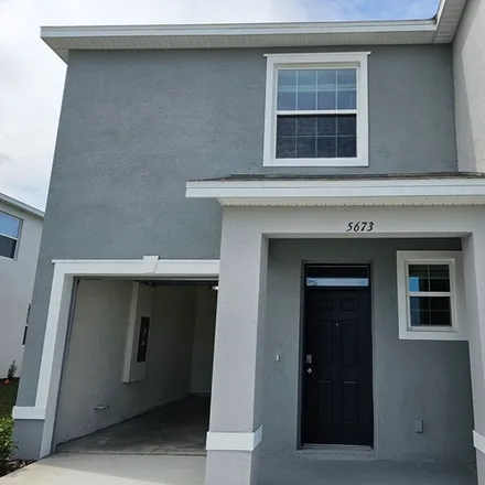 Rent this 3 bed townhouse on 5673 English Oak Lane