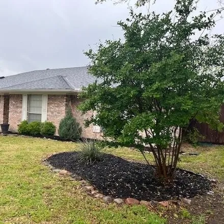 Rent this 4 bed house on 1809 Kensington Drive in Carrollton, TX 75007