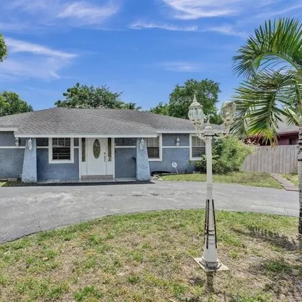 Buy this 3 bed house on 1319 Southwest 75th Avenue in North Lauderdale, FL 33068