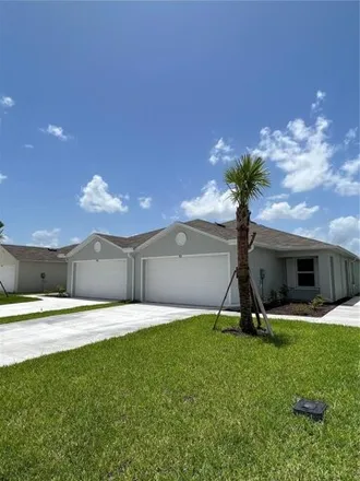 Rent this 3 bed house on 9106 Aegean Circle in Lehigh Acres, FL 33936