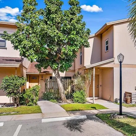 Rent this 2 bed townhouse on 1420 Lake Mango Way in West Palm Beach, FL 33406