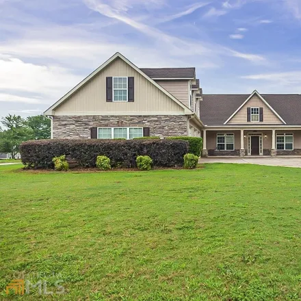 Buy this 4 bed house on 3 Riviera Drive Southeast in Covington, GA 30014