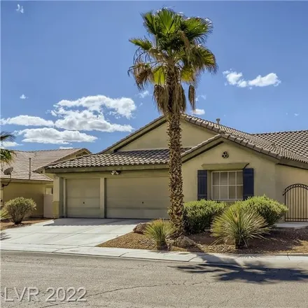 Buy this 4 bed house on 5933 Autumn Damask Street in North Las Vegas, NV 89081