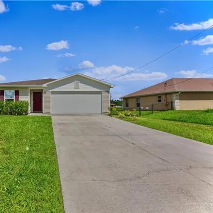 Buy this 4 bed house on 1068 Halby Ave S in Lehigh Acres, Florida