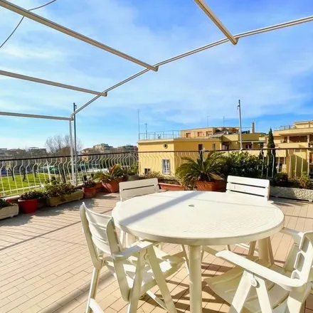 Rent this 2 bed apartment on Via Luigi Borsari in 00112 Rome RM, Italy