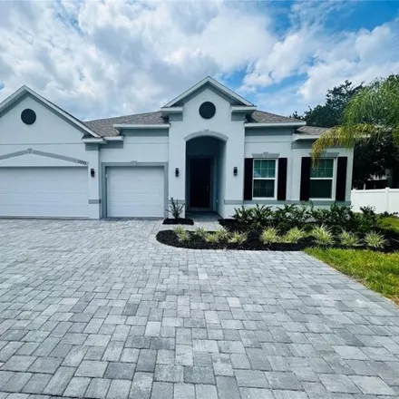 Buy this 4 bed house on 1003 Tawny Eagle Drive in Groveland, FL 34736