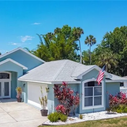 Buy this 3 bed house on 2243 Davis Drive in New Smyrna Beach, FL 32168