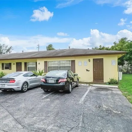 Buy this 5 bed house on 1908 Northwest 14th Avenue in Middle River Vista, Fort Lauderdale