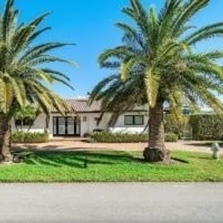 Rent this 3 bed house on 2710 Spanish River Road in Boca Raton, FL 33432