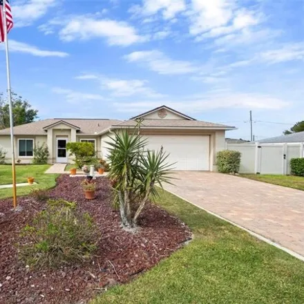 Buy this 3 bed house on 1248 Azora Drive in Deltona, FL 32725