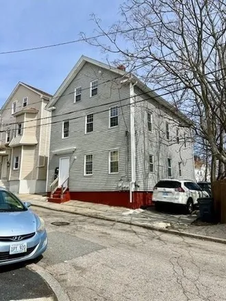 Buy this 4 bed townhouse on 1 Audrey Street in Olneyville, Providence