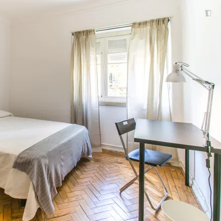 Rent this 5 bed room on Avenida General Roçadas in 1170-340 Lisbon, Portugal