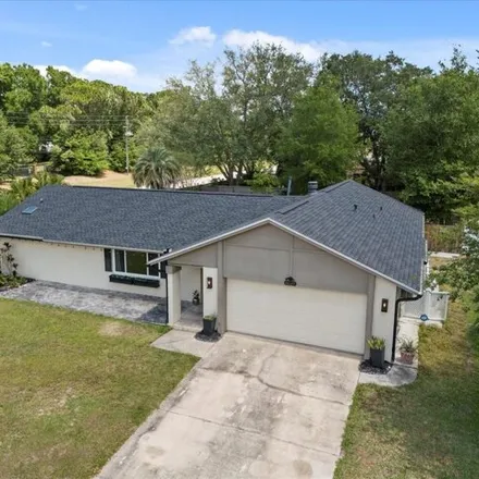 Rent this 4 bed house on 7929 Granada Boulevard in Doctor Phillips, FL 32836