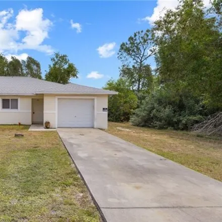 Rent this 3 bed house on 220 Meadow Road in Stoneybrook, Lehigh Acres