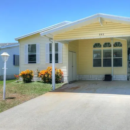 Buy this 2 bed house on 1001 Barefoot Circle in Brevard County, FL 32976