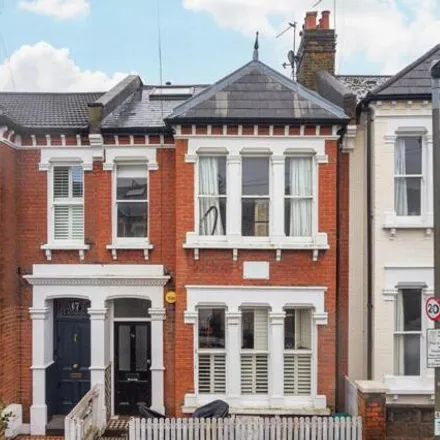 Buy this 3 bed townhouse on Fontarabia Road in London, SW11 5PF