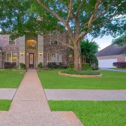 Buy this 4 bed house on Willow Fork Country Club in 21055 Westheimer Parkway, Katy