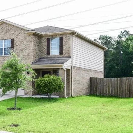 Rent this 3 bed house on Marker Ridge Drive in Harris County, TX 77338