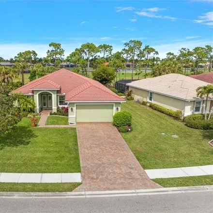 Buy this 3 bed house on Golf Club At Magnolia Landing in 3501 Avenida del Vera, North Fort Myers