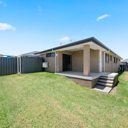 Rent this 4 bed duplex on Stonebark Court in Greta NSW 2334, Australia