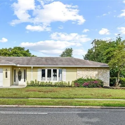 Buy this 4 bed house on 2862 Little John Road in Orange County, FL 32792