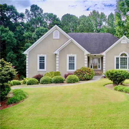 Buy this 4 bed house on 1662 Millennial Lane in Gwinnett County, GA 30045