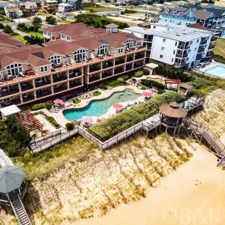 Buy this 3 bed condo on Croatan Surf Club in 1323 North Virginia Dare Trail, Kill Devil Hills