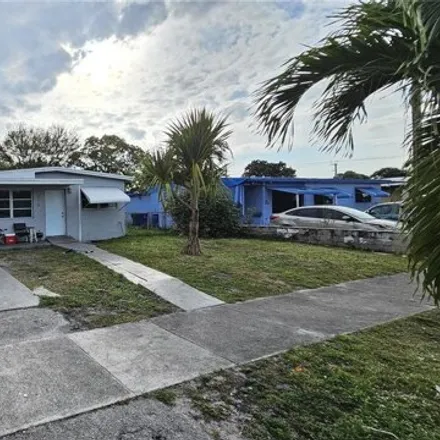Buy this 4 bed house on 266 Northwest 30th Terrace in Washington Park, Broward County