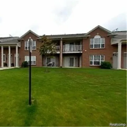 Rent this 2 bed condo on 13211 Chesapeake Cir in Commerce Township, Michigan