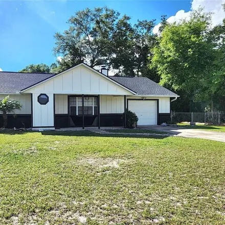 Rent this 3 bed house on 5986 Southeast 42nd Avenue in Marion County, FL 34480