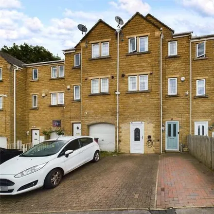 Buy this 4 bed townhouse on Princeton Close in Fountainhead, HX2 0US