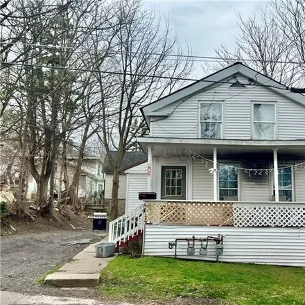 Buy this 4 bed house on 208 Utica Street in City of Fulton, NY 13069