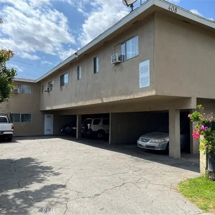 Buy this 7 bed house on 408 S Parton St in Santa Ana, California