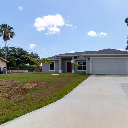 Buy this 4 bed house on 995 Sable Circle Southeast in Palm Bay, FL 32909