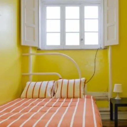 Rent this 4 bed room on Rua Damasceno Monteiro 59 in 1170-108 Lisbon, Portugal