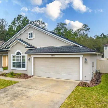 Buy this 4 bed house on 5902 Alderfer Springs Drive in Jacksonville, FL 32258