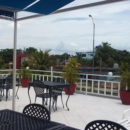 Rent this 5 bed house on Cienfuegos in Punta Gorda, CU