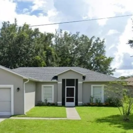 Rent this 3 bed house on 611 Delmonte Court South in Poinciana, FL 34758